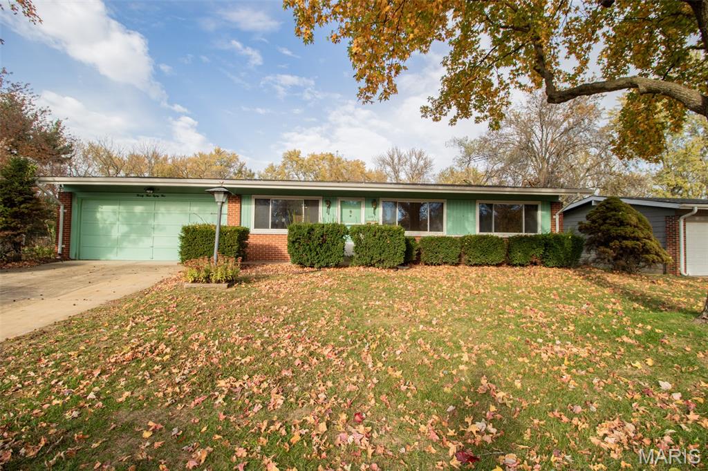 FINISH THIS PROJECT! 3 bed 1.5 bathroom house with a large lot with some mid-century charm. Paddock Hills neighborhood, easy shopping, close to schools, quick access to Lindbergh road. This home has 1160 square feet. Original wood floors. Kitchen has been partially updated with white shaker cabinets, white granite counters. Bedrooms are spacious. Large vinyl windows. Tiled bathrooms. Basement is partially finished, with a bonus room, and large space for storage. Two storage sheds that match the home in the backyard. This is a cute charming house! Take over this project.