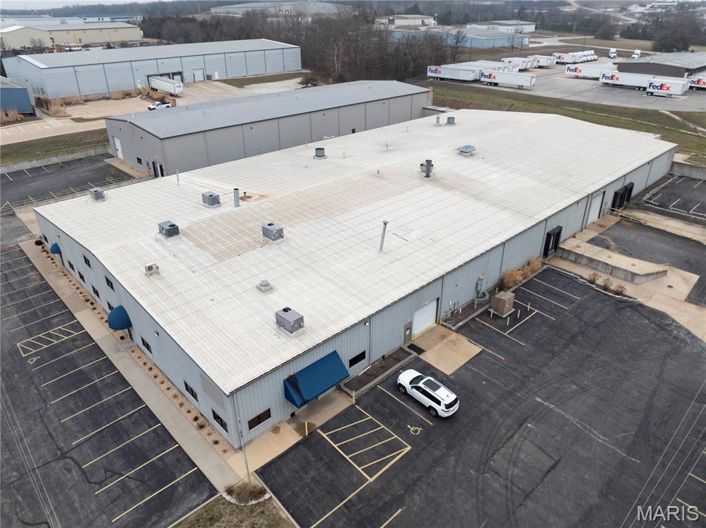 63,625 SF Industrial Manufacturing Facility on 3.42 Acres | St. Clair, MO

This well-maintained 63,625 square foot metal industrial manufacturing facility sits on 3.42 acres in a highly accessible St. Clair, Missouri location, less than one mile from I-44 and approximately 35 minutes from the I-270/I-44 interchange. Designed for efficiency and scalability, the property is ideally suited for manufacturing, warehousing, distribution, or fulfillment operations.

The property features two connected industrial buildings totaling 63,625 SF, including a 45,230 SF main facility built in 1990 and an 18,000 SF warehouse expansion completed in 2017. The buildings are seamlessly connected via a fork truck corridor, allowing for smooth internal workflow and operational efficiency.

The main building is fully conditioned and supported by upgraded power, making the facility highly attractive to modern manufacturing users. With very little deferred maintenance, the property offers a move-in-ready opportunity with updates that will translate well to another manufacturing or industrial operation.

Strategically positioned with excellent access to major transportation routes, this facility provides the infrastructure, location, and flexibility demanded by today’s industrial users.
