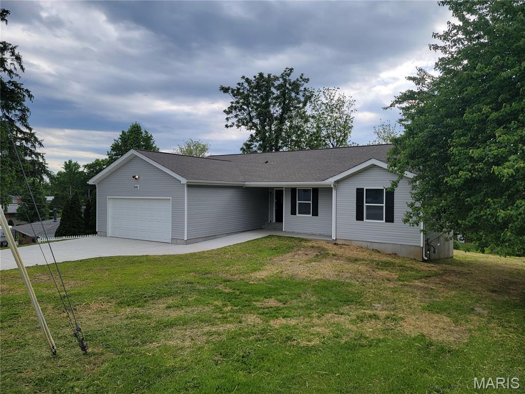 Brand new 3 bed 2.5 bath rach home on 1 acre lot with 2 car attached garage.  This home has a deck, walk out basement, high efficiency HVAC,  main floor laundry, island kitchen, and is sure to impress when you take a look.  Directly across the street from the Community center and park in a great part of town.