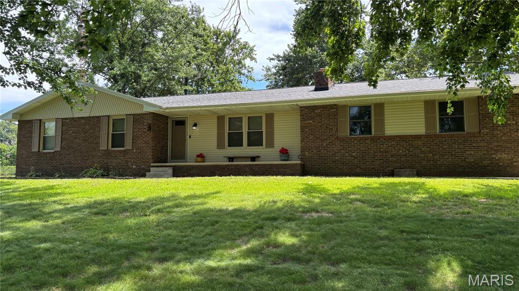 Enjoy the Beautiful Country Scenery on Rolling Hills, the Cool Breeze & Country living on 7 acres,  includes a 40'X60' Pole Barn with 2 permanent horse stalls. Wood Burning Fireplace, Ceiling Fans in all rooms, Public water, Well has not been used.  New Roof & Gutters 2018, Water Heater & HVAC 2017, New windows 2017- 2022, Wiring 2017, Septic tank lines replaced 2022, emptied 2025. Brand new Built in Microwave,  New carpet in living room and bedrooms will be installed June 24th.