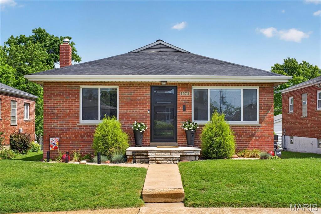 Prepare to fall in love with this super cute, beautifully updated brick ranch bungalow in the highly sought-after Northampton neighborhood! From the moment you arrive, the charming front porch welcomes you into a light-filled interior boasting gorgeous hardwood floors and freshly painted throughout. The heart of the home features a stunning kitchen complete with custom cabinetry, a pantry, and sleek stainless steel appliances.  The bedrooms all have ceiling fans, and the primary has a custom walk-in closet! Things to note, new roof in '22, front door & storm door in '23, water heater in '25, and dishwasher in '26!!!

Need more space? The partially finished lower level adds an amazing extra living area, perfect for a family room or recreation space, including a bar, plus a convenient half bath. Step outside to your level, fully fenced backyard—an ideal oasis for entertaining or pets—complete with a patio and a rare, detached 2-car garage. Incredible South City location close to local parks, dining, and shopping. Don't miss this turnkey gem!