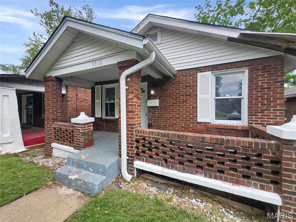 Welcome to this charming 1,108-square-foot brick home in St. Louis, featuring a functional and inviting layout with two bedrooms and one bathroom. A welcoming front porch adds to the home’s curb appeal, perfect for relaxing or greeting guests. Inside, you’ll find comfortable living spaces enhanced by natural light, creating a warm and livable atmosphere. Conveniently located near local amenities, this home offers both comfort and potential, ready for its next chapter.