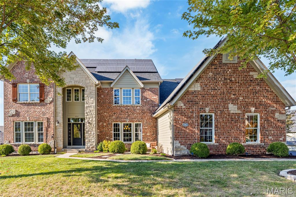 Spectacular brick & stone 2 Sty in gated Spring Mill Estates. This Fischer & Frichtel-built home features well-proportioned rooms with oak & marble flooring, soaring ceilings & detailed trim work. Impressive 2-sty foyer highlighted by flared oak staircase leads to well-appointed study, elegant dining room, private office and stunning great room with dramatic wall of windows. Designer kitchen with 42” cherry cabinetry, stainless steel appliances, center island & butler’s pantry adjoins light-filled breakfast room with atrium door to screened porch & hearth room with stone fireplace. Front & rear staircases access spacious primary bedroom suite with luxury bath with freestanding tub plus 3 additional bedrooms, 1 with ensuite bath & 2 with Jack n’ Jill bath. Lower Level entertainment space includes recreation room with floor-to-ceiling fireplace, game room, gathering bar, office, workout room & full bath. Sliding glass doors open to outdoor living area with deck & covered & open patios.