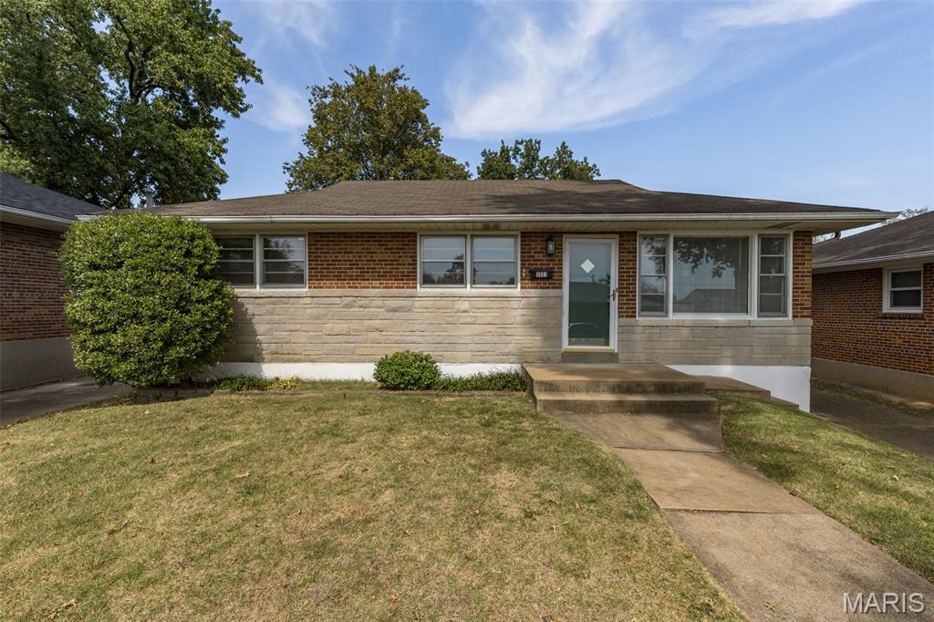 Pride of ownership shines throughout this charming 3-bedroom brick & stone ranch! From the moment you arrive, you'll appreciate the classic curb appeal, spacious driveway and inviting, well-maintained feel of this move-in-ready home.  Step inside to a fresh neutral décor complemented by new carpeting on the main floor, and updated lighting. The updated kitchen features warm oak cabinetry, tiled backsplash and plenty of workspace for preparing meals.  The living space continues downstairs, where the partially finished lower level showcases a huge L-shaped recreation room that's ready for movie nights, game days and entertaining. And don't miss the vintage bar area—a fun throwback that's just waiting to become your favorite gathering spot!  Outside, the large, level fenced backyard provides plenty of room for kids, pets, gardening or simply relaxing.  The concrete patio area creates the perfect setting for summer BBQs, outdoor entertaining or gathering around the firepit on a crisp fall evening.

Additional highlights include a newer water heater installed in 2026, plus a location that's hard to beat—within walking distance of Carondelet Park and conveniently located near shopping, restaurants and interstate access.  Solid construction, thoughtful updates, fantastic outdoor space and a location you'll love—this is one you'll want to see in person. Welcome Home!