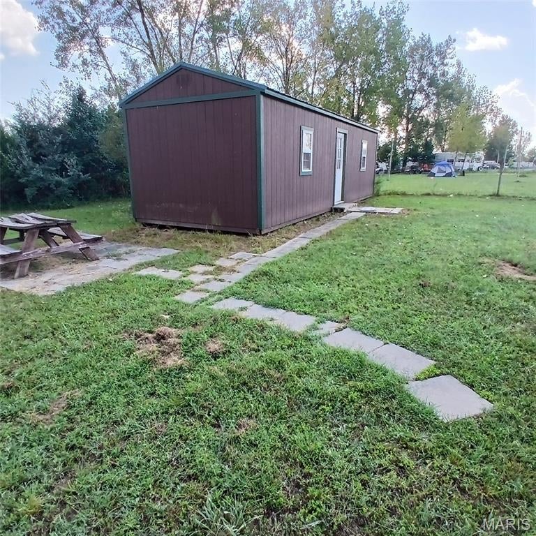 Welcome to this Lake Hanna lot on Venezia Drive, offering a perfect blend of peaceful lake living and convenient access to town. This property features a nice unfinished cabin, giving you the ideal blank canvas to finish exactly the way you want — whether you’re dreaming of a cozy weekend retreat, a fishing getaway, or a place to get away with your family!

The lot sits in one of Lake Hanna’s most desirable areas, surrounded by several lakes perfect for fishing, kayaking, and exploring. With multiple recreation spots nearby, there’s always something to do — from boating and swimming to hiking, relaxing, or simply enjoying the quiet beauty of the Arcadia Valley region.

Being close to town, you get the best of both worlds: privacy and nature without sacrificing convenience. Whether you’re looking for a project, a vacation spot, or a place to build your own lakeside escape, this property offers tremendous potential and a great location.
 
Also, visit the flats, a place that the lake offers to take all your toys to ride! Take your family and ride your heart out!