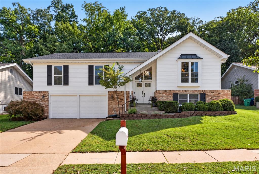 Welcome to 632 Amberwood Lane! Beautifully maintained and thoughtfully updated, this spacious 4-bedroom, 3-bath home offers exceptional comfort, versatile living spaces, and a peaceful naturescape in the desirable Ridgemont neighborhood. Step inside to a bright, inviting interior featuring vaulted ceilings, hardwood floors, and an open floor plan with an impressive great room. The beautifully refreshed kitchen offers custom cabinetry, solid-surface countertops, a breakfast bar, newer GE appliances, and stylish new porcelain tile flooring, with a welcoming breakfast area just beyond. A separate dining room provides the perfect setting for entertaining. The main-level primary suite offers a relaxing retreat with a walk-in closet and private bath, accompanied by two additional bedrooms and a refreshed hall bath. Downstairs, the expansive lower level adds valuable flexibility with a large family/recreation room, an additional bedroom or sleeping area, a full bath, laundry, and space for a home office, hobby room, or storage. Numerous thoughtful improvements provide peace of mind inside and outside the home. Outside, enjoy a serene and private setting for relaxing or entertaining on the maintenance-free composite deck. Established native landscaping, newer fencing, and an attached 2-car garage complete this wonderful home. Comfortable, welcoming, and move-in read. This is a home designed for living well.