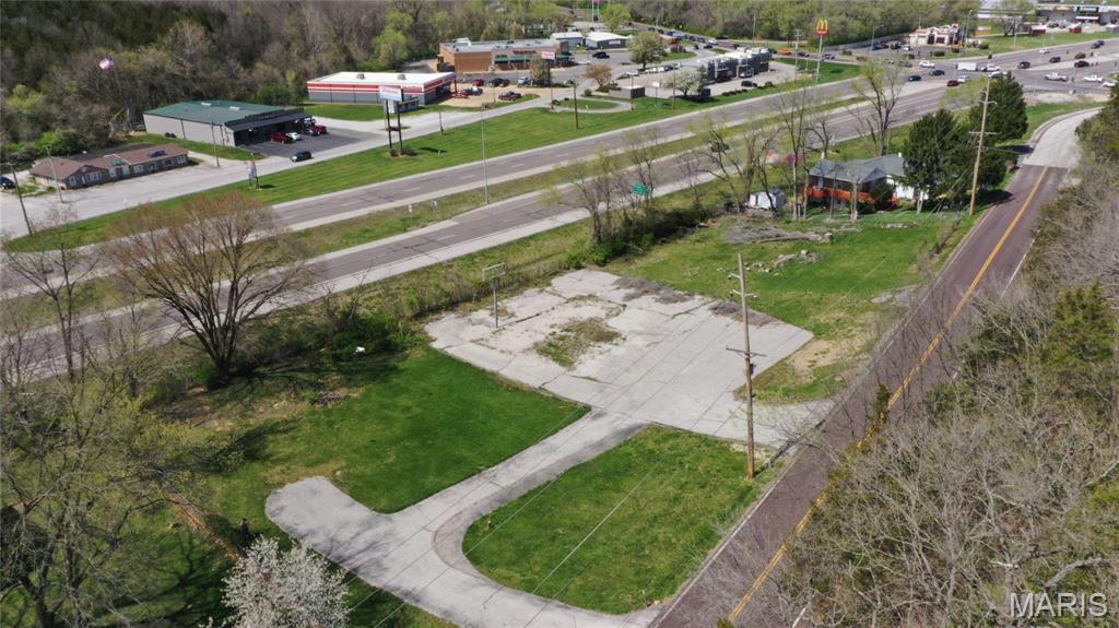 Zoned C-1 Excellent opportunity in House Springs! Over 1.1 acres with over 300 ft of excellent Hwy Frontage off Highway 30! Parcel is made up of 3 lots sold as one 4537 Dulin Creek, 4549 Dulin Creek, and 4543 Dulin Creek rd. Parcel was home to a doctor's office for over 30 years and 2 rental homes. Buildings were leveled to basements and properly filled. This is an excellent opportunity for an Urgent care, service station, fast food, doctors office and more. Sewer on site. Location: Hwy/Interstate Frntg