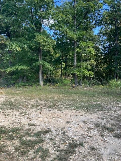 Looking for a wooded getaway property. This could be it. This 25.24 acres is wooded but has a deeded access road along two sides. 
It also includes deeded access to a nearby shared spring-fed stream, and sits within about a mile of Mark Twain National Forest. 
This affordable Ozark oasis comes with NO restrictions, and can be had for less than the price of a new truck. And there's a nice deeded easement gravel road leading from the county road to your property.
Hunt, camp, build, ride ATVs on your own land, or fish or play in the shared creek section ... endless opportunities.
This property is wooded and rolling. You are within a mile of the 22,176-acre Mark Twain National Forest ... public ground where you can also hunt, ride and explore. All this, and only about 2 miles by road from U.S. 67.
Use this land as a base camp for adventure. This and surrounding land is teeming with deer, turkey and small game, and the occasional feral hog or maybe a black bear.