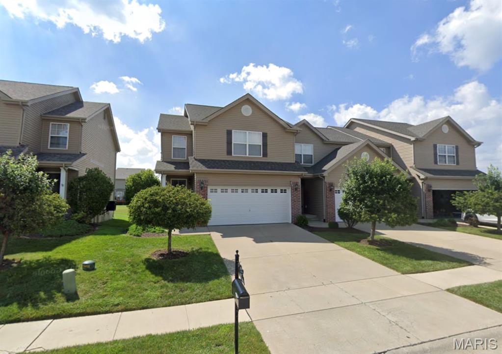 Townhouse in Fountain Place Subdivision, 19 x 15 Living Room Features Marble Surround Gas Fireplace and Hardwood Flooring, 14 x 10 Kitchen with Glass Top Electric Range, Built In Microwave, Garbage Disposal and Refrigerator, Second Floor Provides 16 x 13 Master Suite with Walk In Closet and Private Bathroom, 14 x 10 Second Bedroom, 10 x 10 Third Bedroom, Full Hallway Bathroom, Second Floor Laundry, Two Car Attached Garage, Weed and Feed, Lawn Care and Snow Removal Included, Community Pool Privileges Available, Photos of Similar Property, Updated Photo Gallery Coming Soon, Available 07/01/2026.