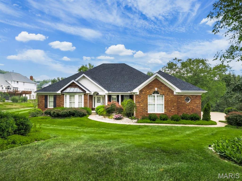 Seeking a refined 4 bedroom ranch in Chesterfield/Wildwood that pairs architectural presence with effortless main level living? This 4,221 square foot residence in the coveted, resort inspired enclave of Wildhorse Village presents a rare blend of scale, privacy, and elevated design on over half an acre of level, manicured grounds.

Thoughtfully reimagined for modern luxury, the home showcases an open, light filled floor plan enhanced by raised door heights, updated flooring, and curated designer lighting. Expansive living and dining spaces flow seamlessly for both intimate gatherings and grand entertaining.

The chef’s kitchen is a statement in both form and function, anchored by an oversized island and appointed with double wall ovens, an integrated microwave, and a fully retractable slider that opens wide to the outdoor living area. The result is a seamless indoor outdoor experience ideal for sophisticated entertaining.

All bathrooms have been meticulously renovated with timeless finishes and elevated materials. The primary suite offers a serene retreat, complete with a walk in closet and a spa inspired ensuite bath designed for daily indulgence.

The finished walkout lower level extends the living experience with additional lounge space, recreation area, wet bar, full bath, and substantial storage. Whether hosting guests or creating a private escape, this level delivers versatility without compromise.

Recent capital improvements reflect pride of ownership and long term value, including a new architectural roof with 30 year shingle (2025), furnace 2023, water heater 2020, HVAC 2015, and professionally enhanced landscaping. A side entry three car garage complements the estate aesthetic while providing everyday convenience.

Located within the prestigious Rockwood School District, including Lafayette High School, and moments from the finest dining, golf, and retail of Chesterfield, this is a distinguished opportunity in one of West County’s most sought after communities.

Seller is providing a 1 year Assurant Essential Home Warranty Plan for the buyer.