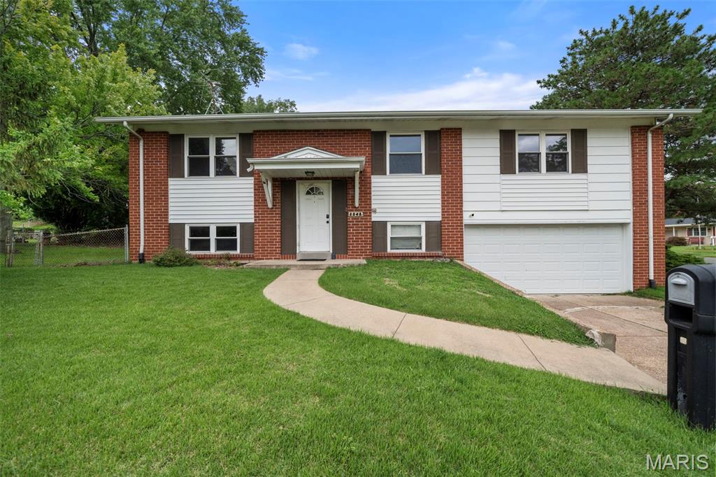 Welcome home! This charming split-level home is filled with natural light and offers the perfect blend of comfort, space, and convenience. Step up to the main level where you'll find a spacious living room that flows seamlessly into the dining area, creating an ideal space for everyday living and entertaining. The bright kitchen offers plenty of room for meal preparation and gathering.

The main level features a primary suite with bath, along with three additional bedrooms and a full hall bathroom. New carpet throughout give the home a fresh, move-in-ready feel.

The finished lower level provides even more living space with a large family room or entertainment area, plus a versatile bonus room that's perfect for a home office, workout space, or hobby room.

Step outside to enjoy the spacious deck overlooking the fenced backyard—ideal for morning coffee, entertaining guests, pets, or playtime.

Conveniently located near shopping, restaurants, schools, and parks, this home offers the perfect combination of comfort, functionality, and location. Don't miss your opportunity to make this wonderful home yours—schedule your private showing today!