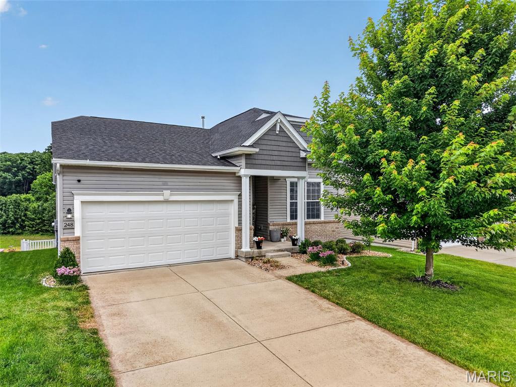 Welcome to this LIKE NEW 3 bedroom, 2 bathroom Ranch, perfectly situated minutes away from Wentzville's best shopping and dining  that is ready for you to call it HOME! Imagine welcoming friends and family into a huge space designed for bringing people together with this full open concept floor plan seamlessly connecting the spacious great room to a kitchen featuring an abundance of cabinets, a massive center island & breakfast bar perfect for gathering, stainless steel appliances, and a sunny breakfast area where guests can mingle & relax! Then head outside to enjoy your summer BBQs on your large deck & private fenced in backyard! Get away from it all in the stunning primary suite with a luxury bathroom featuring a separate shower and soaking tub, dual adult height vanities, and access to the truly expansive walk-in custom-built closet with organization system! Two additional bedrooms provide room to make the house your home. Create a productive home office, curl up with a good book in a cozy reading nook, welcome overnight guests, or design a space for hobbies and creativity! This home offers main floor laundry and a walk-out basement that is ready for the finishing touches of your dreams & possible future equity gains! Someone is going to snatch this stunner up quick, make sure it's you and schedule your private showing today! The location alone makes it a winner, come see the cherry on top!