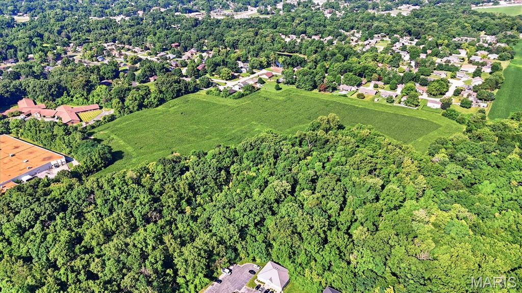 Property is currently zoned Farmland, but can be rezoned to residential or commercial. Currently under a lease, but under the agreement that it can be sold at any time. Property listed is two parcels, both must be included in purchase.