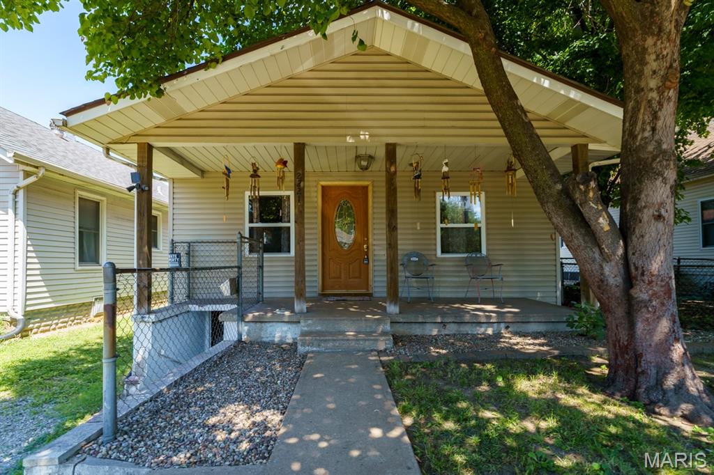 Welcome home to this charming and well-maintained 3-bedroom, 1-bath bungalow in the heart of Granite City! Offering over 1,200 square feet of living space, this home features updated flooring, an updated kitchen and bathroom, a newer electrical panel, and a spacious addition completed in 2007. Enjoy a functional layout with comfortable living areas, a full basement for extra storage, and a covered porch perfect for relaxing. Situated on a manageable lot with convenient access to shopping, dining, schools, and major roadways, this home is an excellent opportunity for first-time buyers, downsizers, or investors looking to add to their portfolio. Schedule your private showing today!
