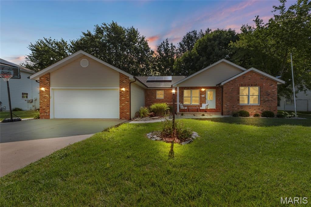 Welcome home to this stunning 3-bedroom, 3-bath residence located in the highly desirable Stone Creek neighborhood! Designed with both comfort and functionality in mind, this home features an inviting open-concept layout with vaulted ceilings that create a bright and spacious atmosphere throughout the kitchen, dining, and living areas that are perfect for everyday living and entertaining. The thoughtfully designed split-bedroom floor plan offers added privacy, with a spacious primary suite featuring dual his-and-her closets and a private en-suite bath. Convenient main-level laundry makes daily chores a breeze, while the attached 2-car garage provides ample storage and parking. The finished basement offers exceptional additional living space with a huge family room, perfect for movie nights, game days, or entertaining guests. You'll also find a versatile bonus room that can easily serve as a home office, playroom, workout space, or a 4th non-conforming bedroom. A large unfinished storage area provides plenty of room for seasonal items, hobbies, or future expansion. Step outside to enjoy the fully fenced backyard that backs to peaceful open fields, offering beautiful views and extra privacy. The expansive covered patio is the perfect place to relax, entertain guests, or enjoy your morning coffee while taking in the serene surroundings. Solar panels will be paid off meaning instant energy savings!! Don't miss this incredible opportunity to own a beautiful home in one of the area's most sought-after neighborhoods. Schedule your private showing today!
