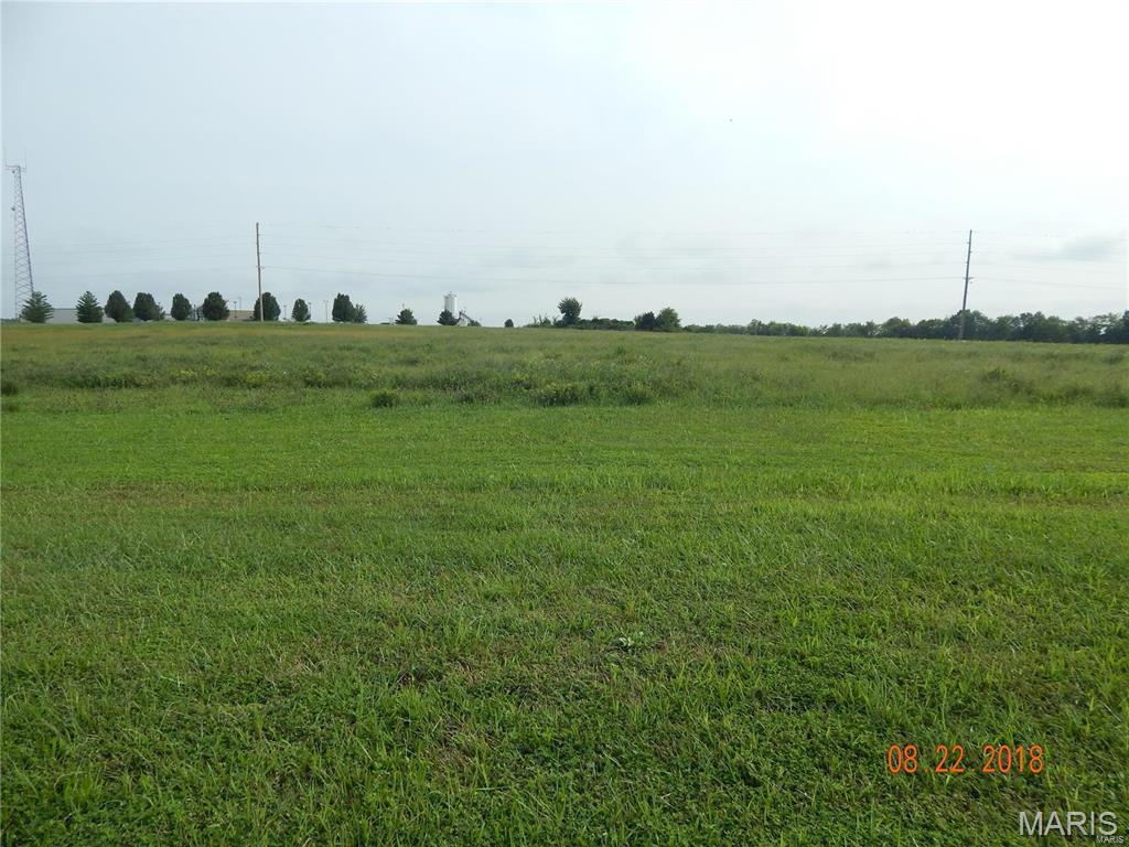 Looking for a building site for your new home? This building site consists of 1.377 acres in New Design Plaza, a country subdivision with easy access to State Route 3 and located within minutes of Waterloo. Your plans-your builder. Plans to be approved by seller. Minimum 1400 sq. ft. Association fee is $45.00 a month covering pumping of individual sewer system & maintenance of community mound system. Public water available at property line, buyer responsible for paying tap fees. Sewer hook-up is available at property line, buyer responsible for installing individual aeration system that connects to mound system. Restrictions available. Additional Rooms: In Platted Subdv.