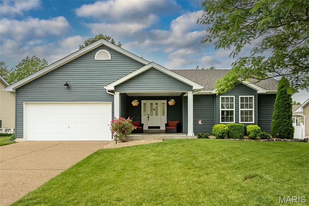 Vaulted ceilings, wide open living spaces, and over 2,700 total finished square feet make this ranch an absolute standout! From the moment you walk in, you’ll love the airy great room, plank flooring, fresh paint, and seamless flow into the spacious kitchen and dining area. The kitchen offers stainless steel appliances, generous cabinet space, and plenty of room to prep, gather, snack, and stay connected while entertaining. The main floor features 3 bedrooms, 2 full baths, and convenient main floor laundry, while the finished lower level brings all the bonus space buyers are craving with a huge rec area, gas fireplace, full bath, sleeping area options, and an incredible custom bar complete with added cabinetry & refrigerator — basically the ultimate setup for game days, holidays, movie nights, and hosting your people in style! Additional improvements include architectural roof, vinyl siding, water heater, dishwasher, range/oven, carpeting, and Seller is offering 1 year home protection plan for added buyer confidence. Outside, enjoy the partially fenced backyard, large patio space, and a neighborhood with amenities including subdivision pool, ponds and walking trails. Spacious, stylish, and loaded with flexibility — this one is going to turn heads fast!