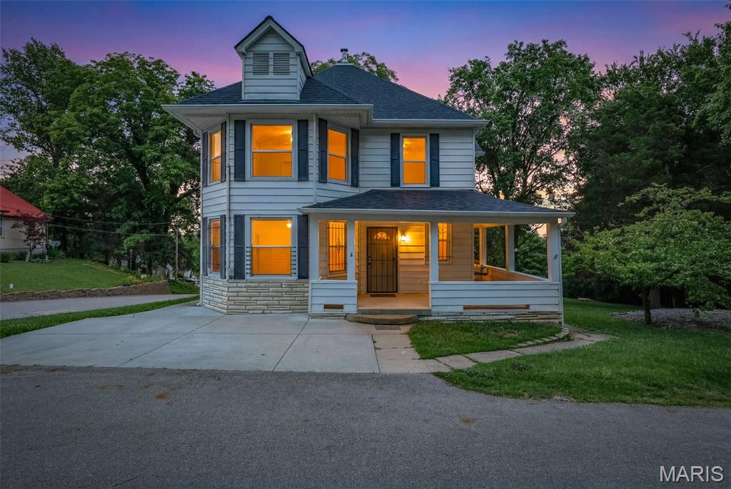 Great 2-story home that has been updated. There is a second lot that is included in this sale to the right of the home. Large concrete patio with a privacy fence around it so you can relax in your own Sauna. Roof 2024, Installed over sized gutter at this time as well, Historical type looking home with some of its original items inside and out. But it is not in the historical district. 200-amp circuit breaker box installed 10 years with all electrical wiring, Plumbing lines redone, Newer poured concrete driveway, second lot has a gravel driveway into it, Home has a rear staircase as well as a front one. Main floor laundry, wet bar and bar area, this home offers 2,312 square feet of living space, Shopping, schools, and hospital close by.  Please come and take a look!
