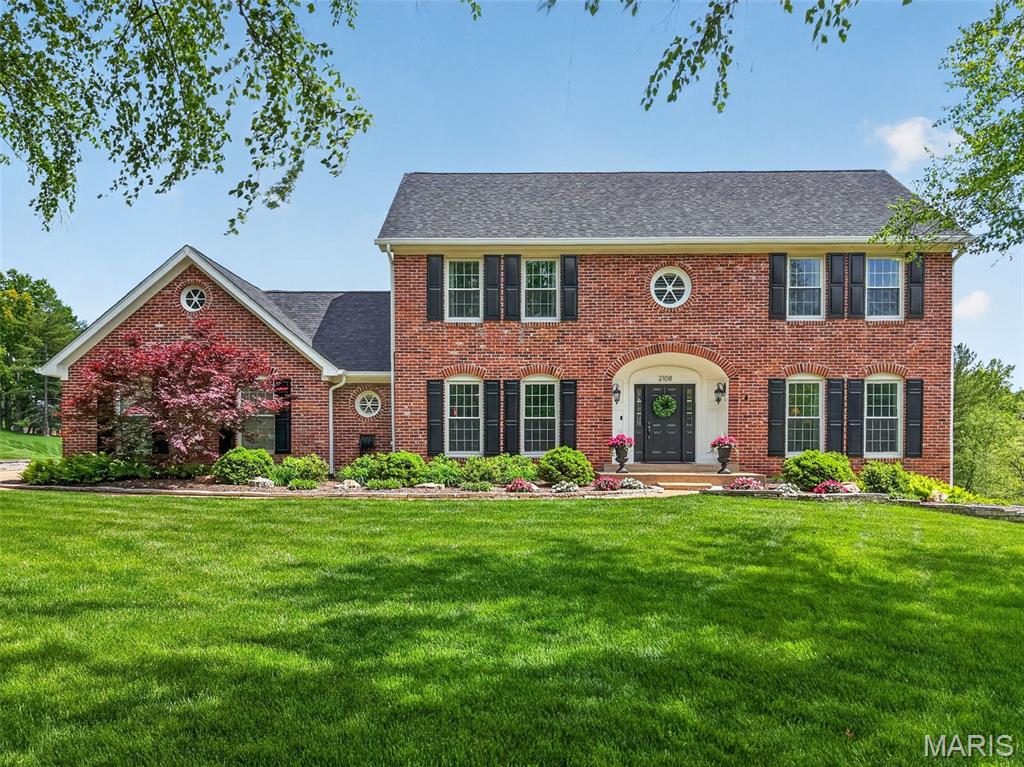 With one of the most breathtaking views in West County, 2108 Stillwater Point Court embodies the lifestyle buyers seek in the Manors of Clarkson Valley. Backing to open ground, the setting offers exceptional privacy, natural beauty, and year-round views. This expansive 5000 square foot two-story on just under 1.2 acres features an EXTREMELY rare four-car garage, saltwater pool, screened porch, composite deck, and walkout lower level. Large windows throughout the home flood the interior with natural light while showcasing the surrounding landscape. Recent improvements include all new windows, refinished hardwood floors, a beautifully renovated primary bath, remodeled powder room, and a new roof and gutters in 2025. The spacious primary suite offers dual walk-in closets, while every secondary bedroom except for 1 also features a walk-in closet. The walkout lower level offers a large recreation room, TV area, full bath, and sleeping area, providing flexible space for guests, entertaining, or everyday living. Located within the award-winning Rockwood School District, this is a rare opportunity to own one of the premier lots in Clarkson Valley.