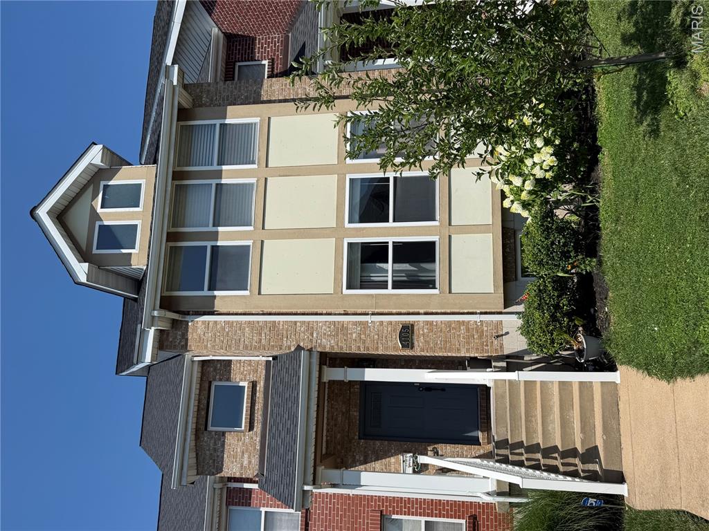 Located in the highly sought-after Gaslight Square District of the Central West End, this well-maintained two-story home offers modern construction, spacious living, and an exceptional location. Built in 2006, this 3-bedroom, 2.5-bath residence features over 2,150 square feet of living space, plus a finished lower level that provides additional room for recreation, a home office, or media space.

The welcoming covered front porch leads into a bright, functional floor plan with generous living and dining areas designed for both everyday living and entertaining. The kitchen offers ample cabinet and counter space along with updated stainless steel appliances, while the convenient main-floor laundry room adds everyday practicality.

Upstairs, the spacious primary suite serves as a private retreat with two walk-in closets and an ensuite bath featuring a soaking tub, separate shower, and dual vanities. A flexible loft area provides the perfect space for a home office, reading nook, or play area, while two additional bedrooms and a full hall bath complete the second level.

The finished lower level includes a large family or recreation room, a half bath, and abundant storage. Outside, enjoy the privacy of a fenced backyard with plenty of space to relax or entertain, along with the convenience of a detached two-car garage.

Situated just minutes from Forest Park, Barnes-Jewish Hospital, Washington University Medical Center, Saint Louis University, the Cortex Innovation Community, and the Central West End's renowned restaurants, coffee shops, boutiques, and entertainment, this home offers the perfect combination of comfort, convenience, and city living. Move-in ready and ideally located, this is an opportunity you won't want to miss.