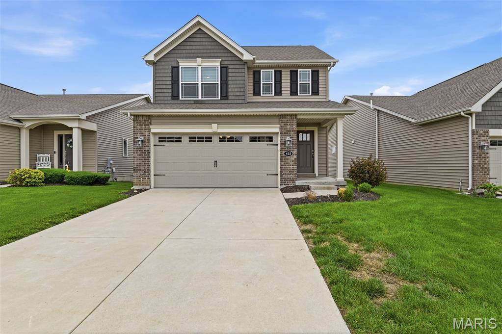 4 BD | 2.5 BA | 1.5-Story | 1,790 Sq Ft

Welcome home to this beautifully maintained 6 year young home, 1.5-story in the highly desirable Charlestown Place neighborhood! Enjoy a low-maintenance lifestyle with lawn care, irrigation/sprinkler system maintenance, and snow removal included in the HOA fee of 100$ per month.

Tucked away on a quiet cul-de-sac, this home backs to common ground with a water feature and offers a playground right on the street. Inside, you’ll find an open, inviting floor plan featuring 42" cabinets with hardware, a center island with seating bar, solid-surface countertops, stainless steel appliances, tile backsplash, transom windows, and Low-E windows. Sale Includes brand new refrigerator and washer & dryer -both appliances are  just over a year old

The main-floor primary suite is a standout with raised double-bowl vanities and a walk-in closet. Upstairs offers three spacious bedrooms, a full bath, and an additional large walk-in closet.

The exterior impresses with brick and vinyl siding with shake accents, plus a 2-car garage. Step outside to a patio overlooking the level backyard backing to common ground. The full basement includes a bath rough-in and egress window, making future finishing easy.

Freshly painted in 2024 and ideally located with quick access to Hwy 370, restaurants, parks, New Town, Historic Main Street, Frenchtown, and Lambert International Airport. Located in the sought-after Orchard Farm School District.

So much to love — don’t miss this one!