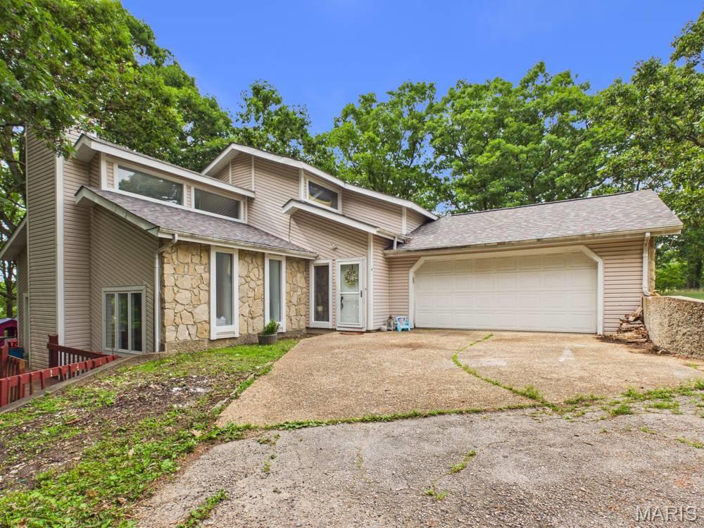 Opportunity and potential await with this 4 bedroom, 3 bathroom single family home. 

Whether you’re an investor, flipper or buyer looking to build equity, this home, situated on just over 5 beautiful acres is well on its way to becoming something truly special with your added vision! 

Immediately entering the home you’ll be greeted by an abundance of natural light bathing every inch of this home, vaulted ceilings and functional layout with main level primary suite and additional bonus room off the primary bedroom ideal for home office, or library. 

The remodel of this home has begun and you will appreciate the improvements already made with bathroom updates, new flooring,  baseboards, doors and fresh paint throughout. 

Existing materials are available and will convey with this home.  Don’t miss your opportunity to turn this promising project into your dream home or next investment. 

Schedule your showing today to see the endless possibilities for yourself!