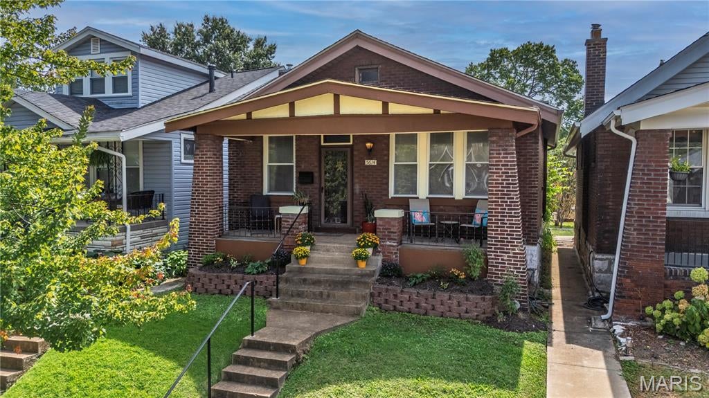 Classic brick, a covered front porch, and the kind of character you just don’t find in every home. This charming bungalow offers a great combination of original appeal, comfortable living space, and a backyard with plenty of room to enjoy.

Inside, natural light pours through the abundance of windows, giving the home a bright and inviting feel. The dining area provides a dedicated space for gathering, while the flexible layout makes it easy to settle in and make each room your own. An unfinished basement adds valuable storage and laundry space with possibilities for additional use.

Out back, the fenced yard is a standout feature with plenty of green space for pets, play, gardening, or entertaining. Raised garden beds are already in place, and the deck provides the perfect starting point for creating your own outdoor hangout. A detached garage and additional parking add everyday convenience.

Whether you're looking for your first home, downsizing, or simply love the charm of an established neighborhood, this bungalow offers a solid opportunity with great outdoor space, classic architecture, and plenty of potential to personalize along the way.