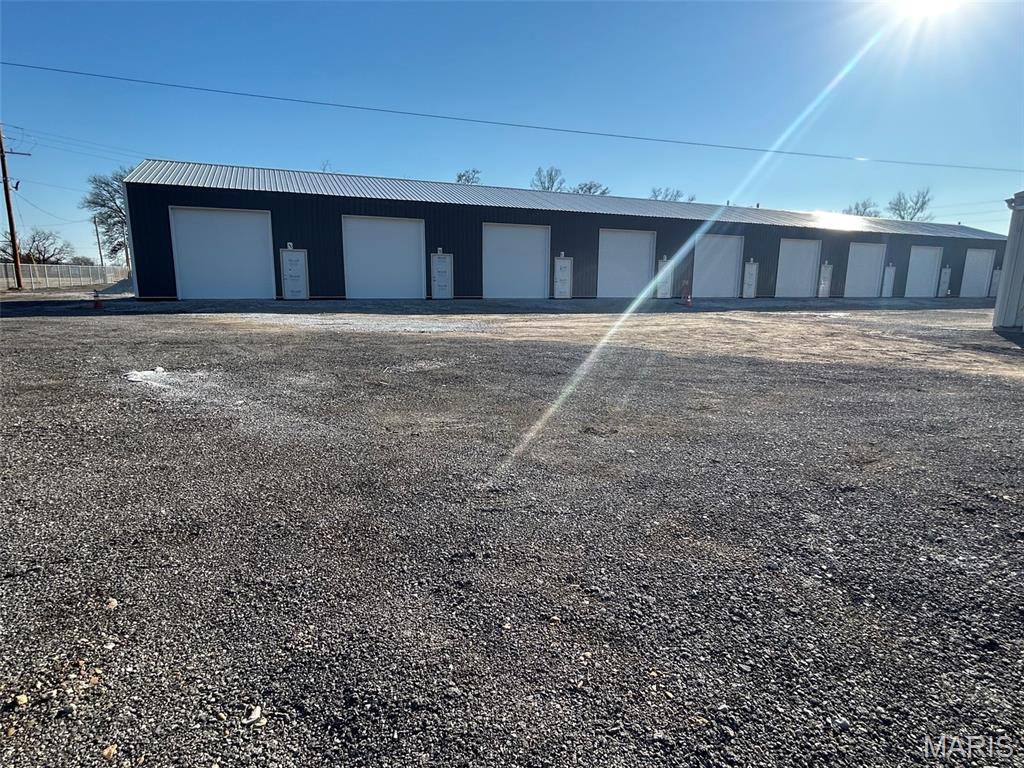 Discover the ultimate versatile space perfectly suited for small business operations, vehicle restoration, hobbyist workshops, or premium personal storage. Located in a secure, easily accessible area in the Godfrey/Alton region. 400-1500 SQ. FT. storage available. 12 ft. rolling overhead doors with man door. Features 24/7 gated access, on site surveillance,private restroom, wi fi capable, and out lot availability. Fully insulated with in unit outlets/ 100 amp service.