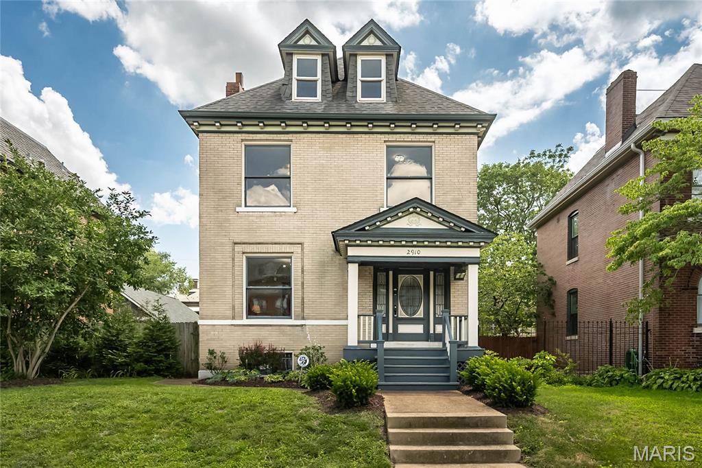 Welcome to 2910 Allen Ave—nestled in the Compton Heights neighborhood with tree-lined streets and rich architectural charm, where timeless character meets thoughtful updates across three spacious levels of living. From the moment you drive down this dead end street, the home’s inviting curb appeal and charming covered front porch set the tone for what’s inside.
You’ll immediately appreciate the beautiful blend of historic charm and modern comfort, with original woodwork, stained glass, and pocket doors seamlessly paired with fresh updates, new lighting, and some updated windows. Rich wood-look LVP floors flow throughout the main level and second levels, creating warmth and continuity from room to room. The bright new kitchen opens effortlessly to the dining area and is designed for both everyday living and entertaining, featuring 42” cabinetry with abundant storage, stainless steel appliances, quartz countertops, and a center island with seating. Just beyond, step out to the spacious and freshly stained deck—perfect for morning coffee or evening gatherings. A stylishly updated half bath completes the main level.
The second level offers three bedrooms, including a primary suite that feels like a true retreat with a walk-in closet, and its own beautifully renovated full bath with a balcony which provides yet another outdoor escape. An additional updated full hall bath with laundry hookups serves the remaining bedrooms.
The third floor adds incredible flexibility with two additional bedrooms—ideal for guests, home offices, or creative spaces. Outside, the huge level backyard offers room to relax or play, complemented by a one-car garage with a brand new door and opener.
Additional updates include a newer HVAC systems and water heater ('25), offering peace of mind for years to come. Set within a vibrant and historic pocket of the city, this home offers a lifestyle that’s as compelling as the property itself, with easy access to nearby parks, local dining, and everyday conveniences. Just minutes from downtown St. Louis, the location blends character, connectivity, and urban ease—making it an exceptional place to call home.