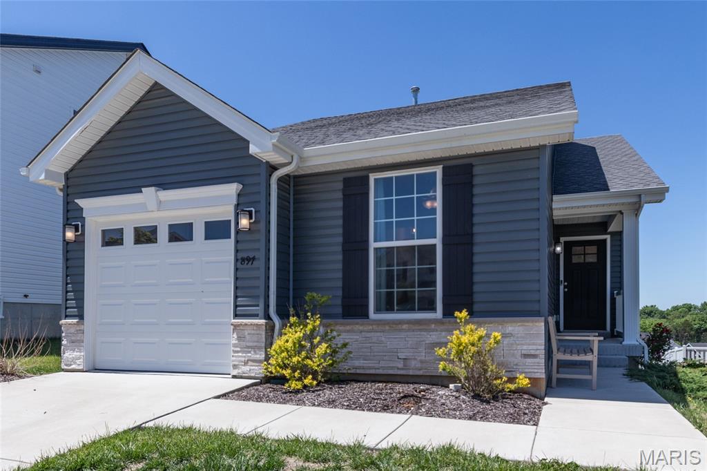 Welcome to this stunning Custom home located in the sought after Bear Ridge subdivision. From the moment you step inside, you’re greeted by a spacious, beautifully designed kitchen featuring granite countertops, a large sink, stainless steel appliances, and ample space for cooking and entertaining.

The kitchen seamlessly flows into the dining and living room combination, creating an open-concept layout perfect for gatherings. The living room has a cozy gas fireplace, ideal for relaxing on cool Missouri evenings. The generously sized owner’s suite offers comfort and privacy, complete with two closets and a private ensuite bath. The main level also includes an additional bedroom and a convenient half bath for guests.

Downstairs, the fully finished lower level expands your living space with a large area for entertaining or relaxing, an additional bedroom, a full bathroom, and plenty of storage. Why wait to build when this move-in-ready custom home has it all? Schedule your private tour today and see everything this beautiful home has to offer.