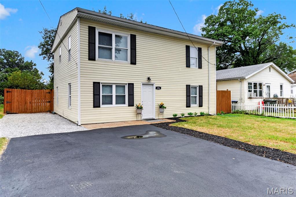 An affordable and rare opportunity to own a completely renovated four-bedroom, two-full-bath home in Dupo! Offering an impressive amount of space for the price, this move-in-ready home has been refreshed from top to bottom, with nearly everything brand new. The bright, spacious kitchen features abundant white cabinetry, generous counter space, stainless steel appliances and durable luxury vinyl plank flooring. Fresh neutral paint, new carpeting and updated finishes continue throughout the flexible living and dining areas. Two full bathrooms and main-level laundry add everyday convenience. Outside, enjoy the one-year-old pool, level yard, fresh landscaping, ample off-street parking and newly paved driveway. Conveniently located near major highways for an easy commute to downtown St. Louis and surrounding communities, this beautifully updated home offers exceptional space, condition and value. Simply move in and enjoy!