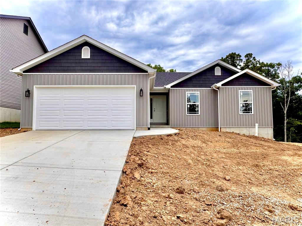 Spec Home Under Construction! Welcome to Hawk Ridge Estates! Located off Hwy B & Brickyard Road. This new subdivision features 29 home sites with all back yards backing to woods. The To Be Built Walnut Model is a 3 Bedroom 2 Bath 1266 sq. ft. Ranch with main floor laundry and 2 Car Garage. The new homes come with quality standard features & have additional options to choose from! The photo is a previous built home & may show optional features. With this being a smaller community lots may sell quickly, hurry today to secure your dream home!