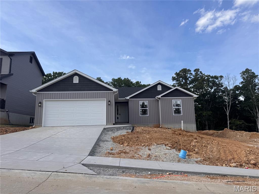 Spec Home Under Construction! Welcome to Hawk Ridge Estates! Located off Hwy B & Brickyard Road. This new subdivision features 29 home sites with all back yards backing to woods. The To Be Built Walnut Model is a 3 Bedroom 2 Bath 1266 sq. ft. Ranch with main floor laundry and 2 Car Garage. The new homes come with quality standard features & have additional options to choose from! The photo is a previous built home & may show optional features. With this being a smaller community lots may sell quickly, hurry today to secure your dream home!