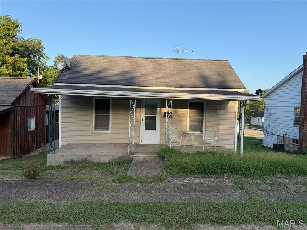 Welcome to 717 S 4th St! This 1-bedroom, 1-full-bath home offers approximately 1,282 square feet of livable space with plenty of potential. The main level features a spacious living area, an eat-in kitchen, a full bathroom, and a versatile bonus room that can be used to fit your needs. The partially finished basement provides additional usable space, including a bonus room that could serve as a craft room, hobby space, office, or potential additional bedroom. The basement also offers convenient walk-out access to the backyard. Outside, enjoy a large, open backyard with plenty of room for entertaining, gardening, recreation, or future possibilities. Off-street parking adds to the convenience. The property is located close to local schools and offers easy access to nearby amenities. The home may require some repairs and cosmetic updates. The HVAC system and roof are older and should be evaluated by the buyer. This property offers an excellent opportunity for a buyer looking to add value and make the home their own. Property is being sold AS-IS and WHERE-IS. Buyer to verify all information and conduct their own inspections and due diligence.