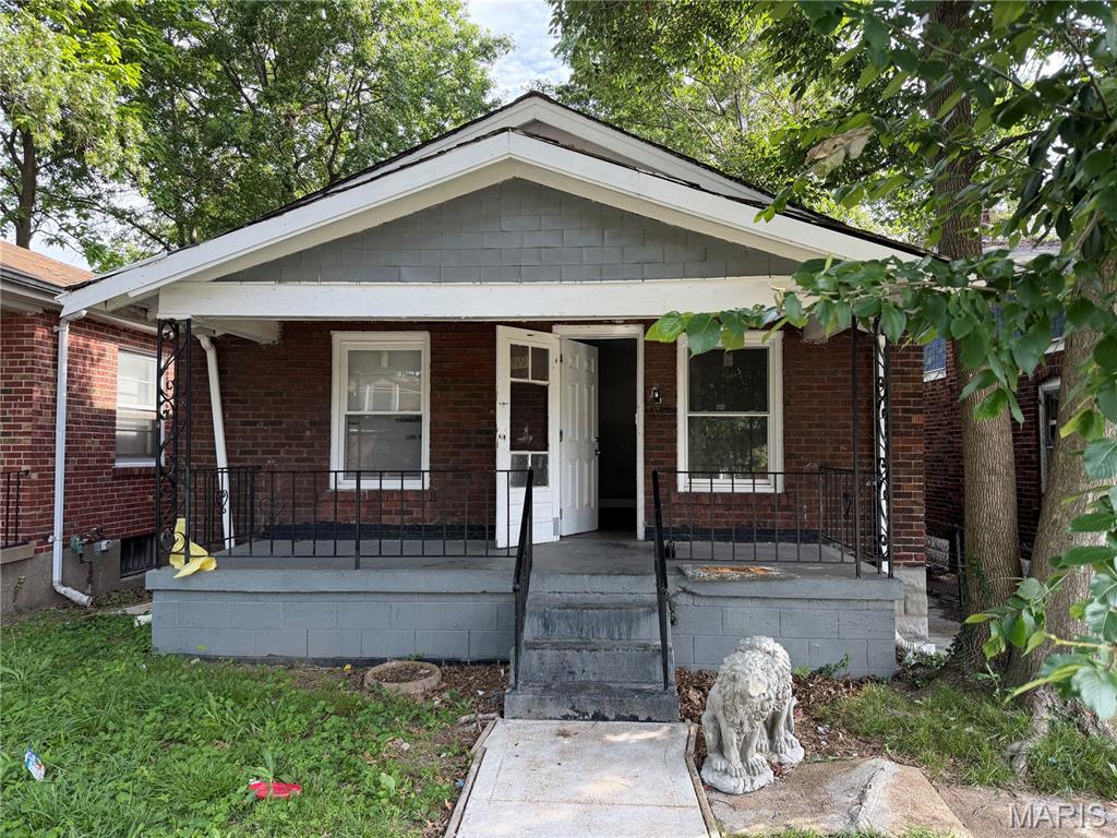 Don't miss this investment opportunity! This all-brick 2-bedroom, 1-bath ranch is tenant occupied and generating $1,100 per month ($1,000 rent plus a $100 monthly sewer reimbursement), providing immediate cash flow from day one. The home features luxury vinyl plank flooring throughout the living room and bedrooms, a spacious eat-in kitchen, and a full basement with washer and dryer hookups offering ample storage. Recent updates include a newer furnace, water heater, and electrical panel, helping minimize future maintenance expenses. Outside, enjoy a rear deck and patio overlooking the backyard, a partially fenced yard, and an off-street parking pad. Whether you're looking to expand your investment portfolio or purchase your first income-producing property, this well-maintained rental is an excellent opportunity. Property is being sold As-Is.
