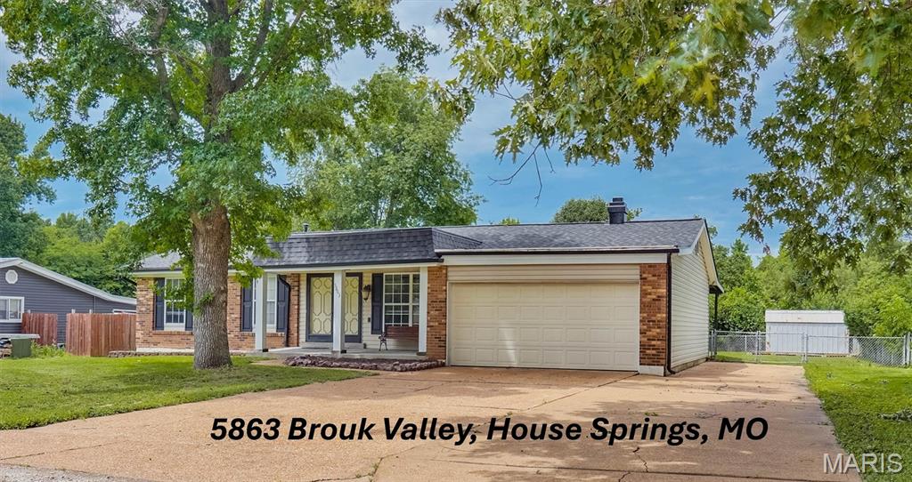 Need a "Home in A Hurry"...this one is ready to go!  Welcome to this Ranch style home offering 3 bedrooms, 2 full bathrooms, and an attached 2 car garage with ample parking space. Enjoy the view of trees as this home backs to a large parcel of common ground. Walk up to the front door and you will find a covered front porch. Inside is the Family room, Kitchen with tons of countertop space, a Dining area, and Den with a brick fireplace. Sliding door leads you to the covered patio and large flat fenced yard. The main floor also offers the Owners Suite with a private full bathroom, 2 additional bedrooms and a 2nd full bathroom. All this comes to about 1,300 sq ft of living space on the main floor, then you have a large basement that is unfinished and ready to design the way you wish! White 6 panel doors, roof is 1 year old,, water heater is 3 years old, brand new sump pump, It's hard to find a home in this price range with such a large backyard. No Community HOA. Seller can close quickly so schedule your appointment now.