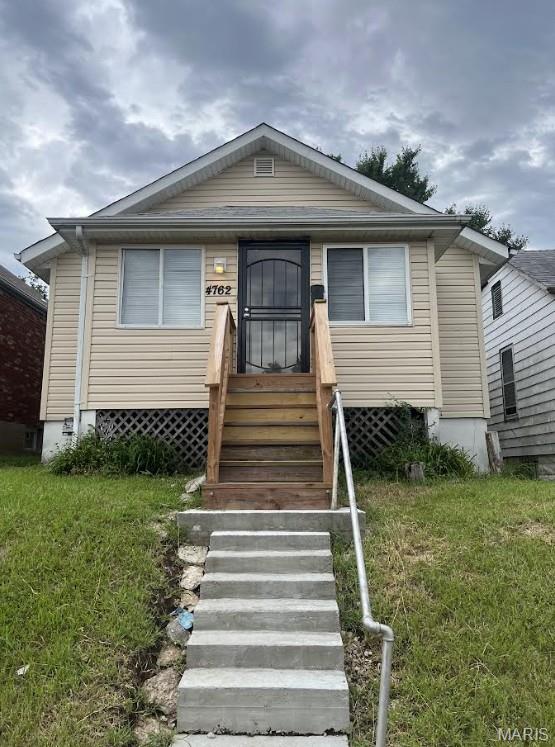 Now that's affordable living! This 2-bedroom, 1-bathroom home is available for just $800 per month. It offers a screened-in porch and inviting updates, along with a refrigerator, built-in microwave, washer, and dryer for added convenience. An unfinished basement provides additional storage space.