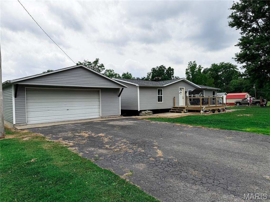 Move-In Ready 3-Bedroom, 2-Bath Manufactured Home with Brand-New Pool & Extensive Updates!

Welcome home to this beautifully updated 3-bedroom, 2-bath manufactured home offering an impressive list of improvements and amenities! This property combines comfortable living with major recent upgrades, giving you peace of mind and plenty of space to enjoy.

Inside, you’ll find 1/2” drywall throughout and 2x6 exterior walls, providing a solid, comfortable feel. The home features an electric furnace installed in 2025, all-new plumbing completed in 2025, and a new gas water heater installed in 2026. The home also includes an electric stove and electric dryer.

Major exterior updates include a new roof and new windows, adding to the home’s overall appeal and efficiency.

Step outside and enjoy the brand-new swimming pool, perfect for relaxing, entertaining, and making memories all summer long. A detached two-car garage provides plenty of room for vehicles, storage, hobbies, or a workshop.

With 3 bedrooms, 2 full bathrooms, extensive recent updates, a brand-new pool, and a detached 2-car garage, this property offers a fantastic combination of comfort, functionality, and value. Come take a look and see all that this move-in-ready home has to offer!