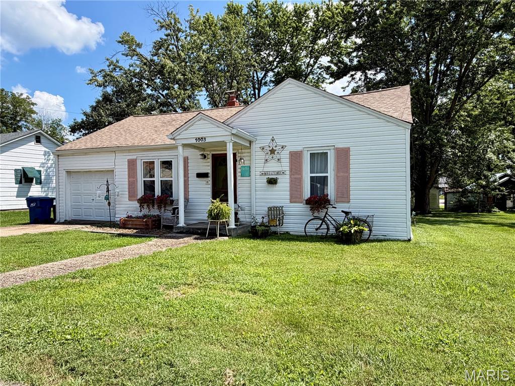 CHARM, CHARACTER & A PARK-LIKE BACKYARD! This adorable 3-bedroom, 1-bath home offers 1,176 sq. ft. of cozy living space tucked away in a quiet neighborhood. Tastefully decorated to highlight its original character, the home features beautiful hardwood floors, arched doorways, and built-in drawers. The spacious primary bedroom offers convenient backyard access. Updates include a new roof in 2025, a bathroom completely gutted and rebuilt approximately 10 years ago, central A/C, and an updated furnace within the last 5 years. An attached garage provides covered parking. Outside, enjoy a spacious backyard with a patio and peaceful, park-like setting, plus a storage shed for lawn mowers and outdoor equipment. The patio furniture can convey with an acceptable offer, making it even easier to enjoy your outdoor oasis from day one! This charming home is ready to welcome its next owner!