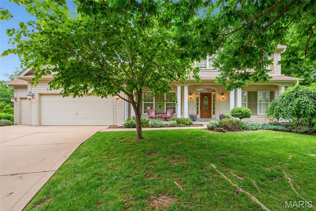 Beautifully maintained 1.5-story home on a cul-de-sac lot in the highly desirable WingHaven community! This 4 bed, 3.5 bath home offers over 3,400 sq ft of finished living space with hardwood floors, crown molding, built-in bookshelves, and a spacious family room with gas fireplace. The gourmet kitchen features a center island, 42” custom cabinetry, double wall ovens, and planning desk. Main-floor primary suite includes dual vanities, soaking tub, walk-in shower, and large walk-in closets. Upstairs offers spacious bedrooms, Jack-and-Jill bath setup, private guest suite, and oversized bonus room perfect for a media room, playroom, or office. Enjoy the private backyard with mature trees, lush landscaping, and large patio. Additional features include irrigation system, zoned HVAC, oversized 3-car garage, and fresh paint throughout. Conveniently located just minutes from WingHaven Country Club amenities!