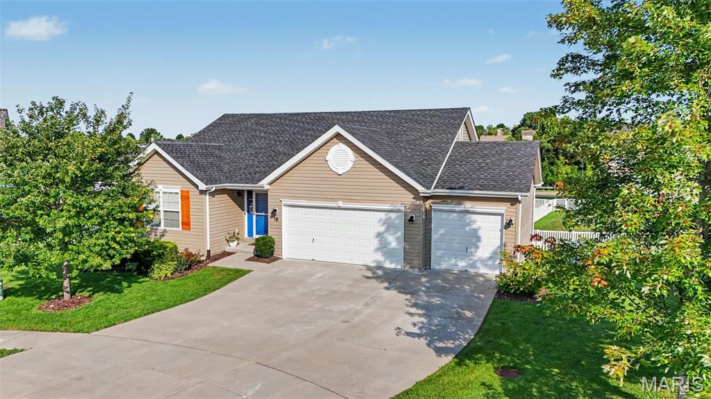 Welcome home! This stunning 4-bedroom, 3-bath ranch is tucked at the end of a quiet cul-de-sac — and it's ready to impress the moment you walk in. Step inside to a bright, open-concept layout where beautiful luxury vinyl floors flow throughout the entire main level, setting a warm, polished tone from the first step. A vaulted great room with a cozy gas-starter fireplace flows seamlessly into every corner of this thoughtfully updated home. This impeccably refreshed home offers polished neutral tones and effortless move-in readiness — no detail left untouched. The entire interior has been freshly painted, with new baseboards, new door hinges and handles throughout, and brand-new carpet in the main-level bedrooms completing the crisp, elevated look.

At the heart of the home, a showstopping kitchen remodel delivers a large custom island topped in quartz, a stylish farm sink, a gas range for the serious cook, abundant cabinetry, and a walk-in pantry that keeps everything beautifully organized — a true dream for entertainers and home chefs alike. A brand-new stainless steel dishwasher and microwave round out the space, ready for immediate enjoyment.

The hall and primary baths have been fully remodeled, joined by refreshed finishes throughout all three bathrooms — new ceramic tile floors, new commodes, and stylish new vanities. Fresh, modern lighting throughout most of the home creates a bright, welcoming feel, and the fireplace has been freshly cleaned and serviced. A Nest thermostat adds smart, efficient comfort control.

Downstairs, a bright, walk-out lower level continues the seamless flow with luxury vinyl flooring carried down the stairs and throughout — creating a cohesive feel from the moment you enter to the lower level living space. Whether you need a private bedroom, home office, guest suite, or a sprawling family/rec room, this flexible space truly delivers. A kitchenette area makes hosting a breeze, and a full bath completes the picture.

Outside, a full lawn sprinkler system keeps the front and large, level backyard lush with zero effort, and an oversized 3-car garage offers all the storage and workspace you could ask for. A large backyard playset is included with the home.

Every major mechanical is already taken care of — a newer architectural roof, a brand-new hot water heater, and new smoke and CO detectors throughout — so you can move in with total confidence. A bid is available for a 12' x 12' deck; see estimate in agent supplements.

Prime Wentzville location puts every convenience — shopping, dining, and top-rated schools — right at your doorstep.

Homes like this don't last. Schedule your private showing today — Elevating Expectations With Excellence, One Home at a Time.
