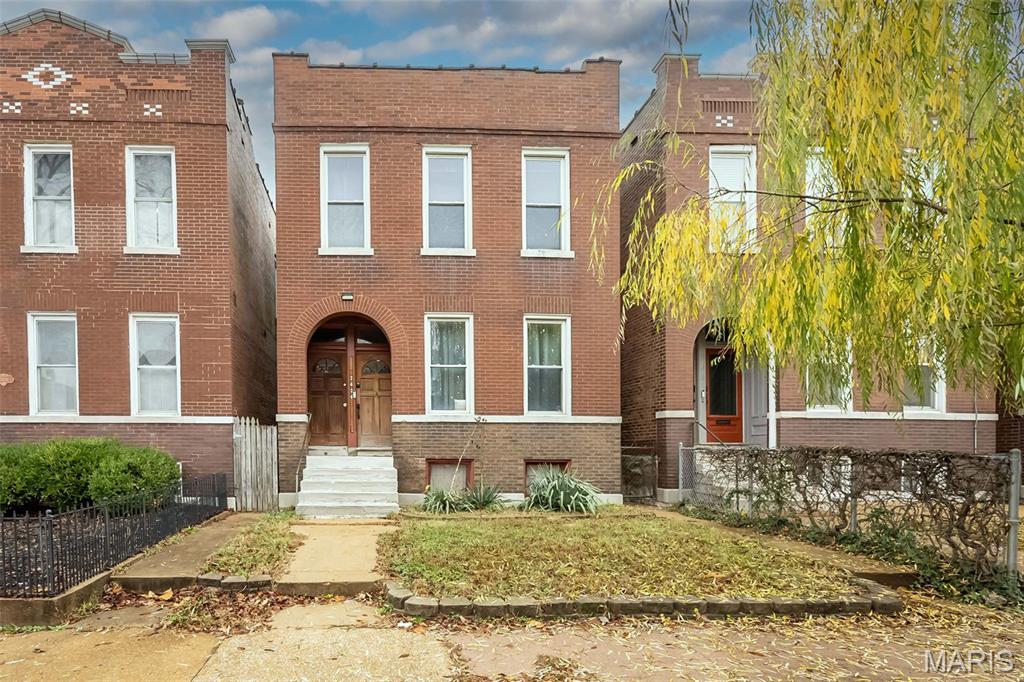 Beautifully Updated Tower Grove East Duplex! This gorgeous and functional property offers the perfect blend of charm, updates, and income potential. The upstairs unit has an excellent long-term tenant on a 2-year lease at $900/mo, while the fully renovated first-floor unit is now available for owner-occupancy, investment, or Airbnb. Step inside the first-floor unit to find stunning wood floors, tall ceilings, neutral paint, and modern lighting throughout. The spacious unit includes lots of natural light, a great sized bedroom and living room, and a beautifully updated bathroom. The kitchen is a showstopper! Complete with gorgeous granite countertops, tall pantry storage, a stylish modern design, and a large eat-in island, ideal for entertaining. Major updates include a newer sewer lateral, water heater, electric panel, deck improvements, and more. The full basement offers abundant storage plus a washer & dryer for both units. The level, fully fenced backyard includes a convenient parking pad for off street parking. Whether you're looking for your next home, a strong investment, or a turnkey short-term rental opportunity, this Tower Grove East gem is a no-brainer!