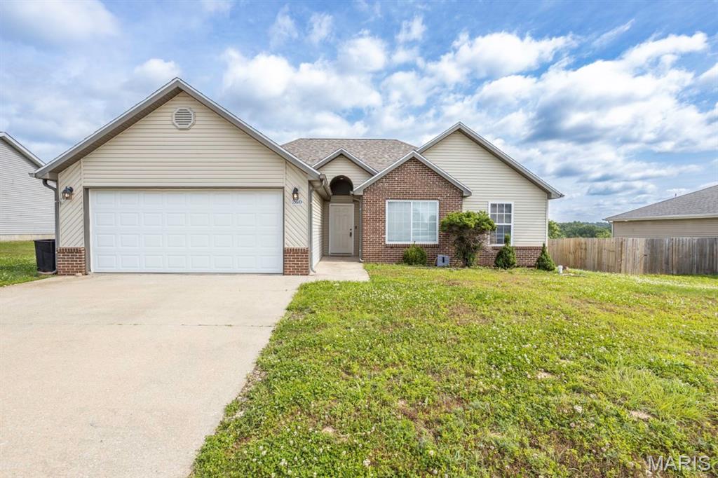 Welcome home to this charming 3-bedroom, 2-bath residence located in a highly desirable subdivision just minutes from the West Gate of Fort Leonard Wood. The open-concept floor plan features a spacious kitchen, dining area, and living room, creating the perfect space for everyday living and entertaining.The large primary bedroom offers a comfortable retreat, while the additional bedrooms provide flexibility for family, guests, or a home office. Recent updates include a new roof installed in June 2023, adding peace of mind for years to come.