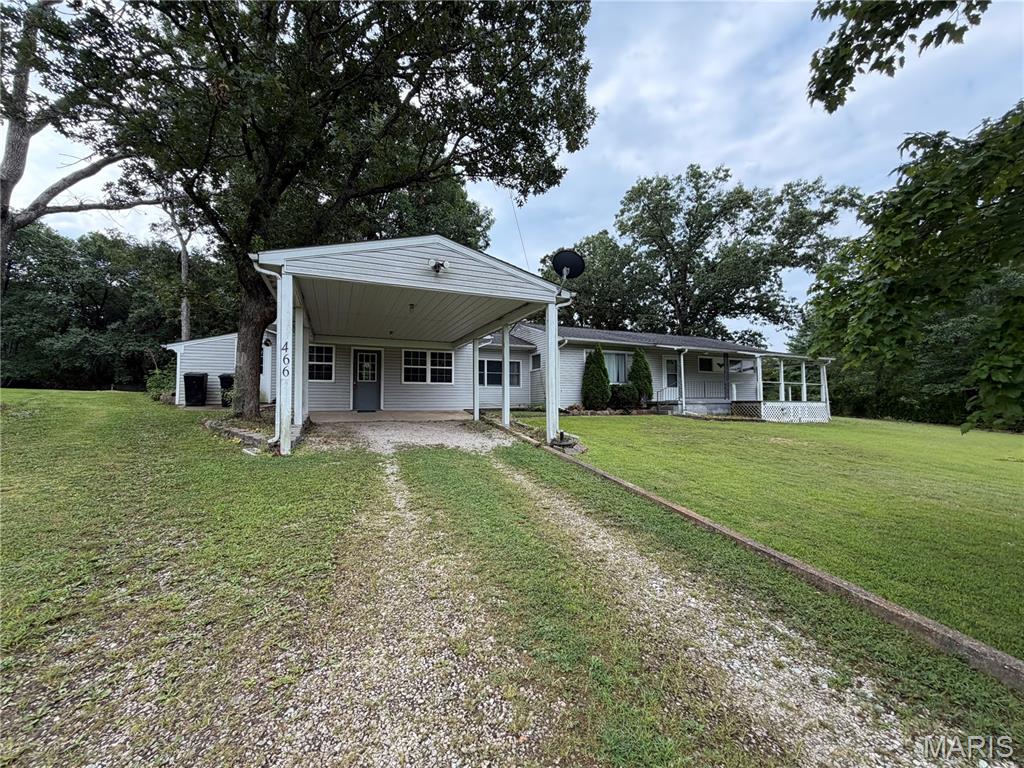 Classic home situated on over an acre with mature trees, a spacious yard, and multiple outbuildings. This 3-bedroom, 2-bath home offers approximately 2,154 sq. ft. of living space with generous rooms and plenty of storage throughout. Cabinetry and closets are abundant, providing excellent storage for everyday living. The home offers unique character throughout, with features that reflect its established charm while leaving plenty of opportunity for a new owner to bring their own style and vision. An attached workshop provides additional space for projects, hobbies, or workspace, while the multiple outbuildings add even more storage and flexibility. Outside, mature trees surround the home and provide a beautiful backdrop for the spacious yard, offering plenty of room to enjoy the outdoors. Located in Doolittle, the property offers a combination of space, character, storage, and functionality that is increasingly hard to find. Come take a look and imagine how you can make this home your own.