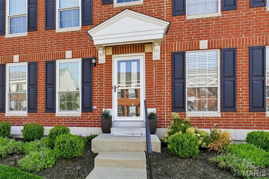 Welcome home to this beautifully updated 2-bedroom, 2.5-bath townhome offering stylish finishes and an impressive finished lower level! The bright and inviting main level features luxury vinyl plank flooring throughout, a convenient powder room, and updated kitchen with quartz countertops and stone style backsplash. Upstairs, you’ll find two spacious bedrooms, each featuring a generous walk-in closet. The finished lower level provides even more living and entertaining space with luxury vinyl plank flooring, a full bathroom, wet bar, wine chiller, and microwave—perfect for movie nights, hosting guests, a home office, or a private retreat. Step outside to your charming, private fenced courtyard to enjoy morning coffee or peaceful evenings. Thoughtful improvements include all-new windows in 2025; quartz kitchen and bathroom countertops, matte-black fixtures, HVAC with humidifier, and water heater in 2022; carpet, dishwasher, washer, and dryer in 2021. Roof replaced 2024 by HOA.  Enjoy low-maintenance living just a short walk from the neighborhood pool and playground. Conveniently located near shopping, dining, parks, and easy access to Highways 70 and 364—all within the Wentzville School District. This stylish and move-in-ready townhome has so much to offer. Schedule your showing today!