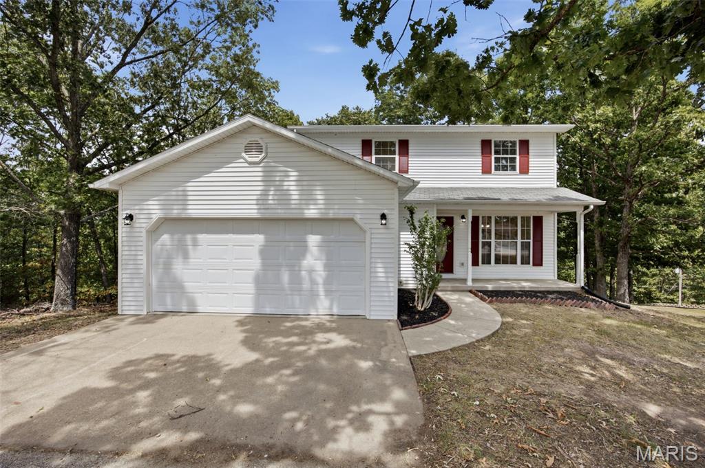 Fully Rehabbed 3-Bedroom Home on 3 Acres! This beautifully updated two-story home offers the perfect combination of modern finishes, space, and privacy in the sought-after Waynesville School District. The main level features a welcoming living room, separate dining area, well-appointed kitchen, and convenient half bath. Upstairs, you'll find three bedrooms, including a primary suite, along with an upstairs laundry area for added convenience.

The walk-out basement offers outstanding future potential and is already framed, insulated, and wired for electric, with a bathroom rough-in in place. With the finishing touches, this space could easily expand the home into a 4-bedroom, 3.5-bath property.

Enjoy peaceful country living from the covered front porch or back deck overlooking the spacious 3-acre lot. Located just outside city limits while remaining convenient to Fort Leonard Wood, shopping, and local amenities, this fully rehabbed, move-in-ready home is ready for its next owner!