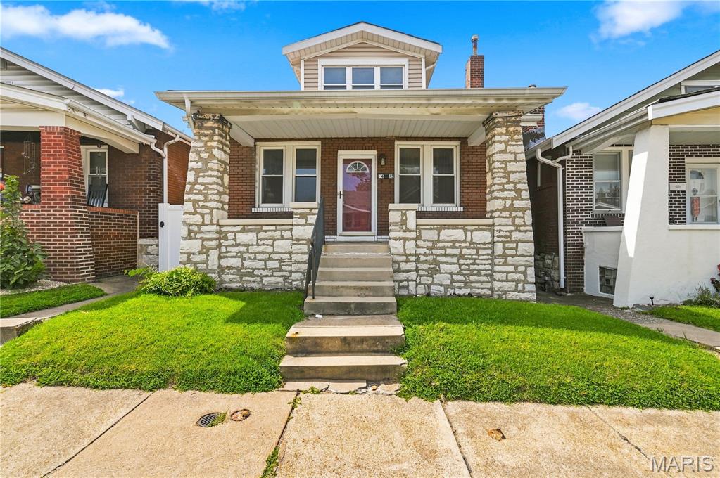 Great opportunity in South City! This classic 1.5 story, brick home offers charming architectural details, laminate floors, a brick fireplace, decorative trim, and unique stained and glass-block windows. The covered front porch adds excellent curb appeal, while the 8 ft vinyl fenced backyard provides private outdoor space, security, and includes a rear deck. Inside, the home offers a great floor plan, good space; and with 2.5 bathrooms, solid systems, and a partially finished basement there is plenty of opportunity for the next owner to add their own updates and finishing touches. Convenient South City location close to shopping, dining, parks and major thoroughfares. A excellent opportunity for an owner-occupant or investor looking to build value and make this home their own.