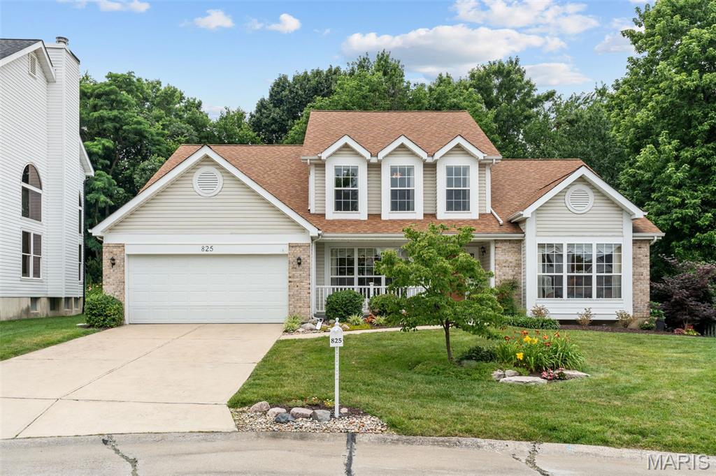 Welcome to the Oakville home of your dreams! Situated on a quiet cul-de-sac, this meticulously maintained and updated 1.5-story features thoughtfully designed spaces both inside and out. You'll have wonderful curb appeal with impeccable landscaping, brick accents, and a large covered front porch. The foyer opens to the spacious formal living room to the right and dining room to the left, featuring gleaming hardwood floors that continue throughout the main level. You'll love hosting gatherings or just relaxing with family in the open layout of the great room and kitchen. A cozy gas fireplace with two-story brick surround is the focal point for the great room, flanked by a wall of windows. The kitchen boasts granite counters, island with breakfast bar, stone tile backsplash, stylish lighting, and some stainless steel appliances. The breakfast room with bay windows connects the great room and kitchen. The primary suite is a retreat with soaring vaulted ceilings, bay window, walk-in closet, dual-sink vanity, step-in shower, and jet tub. A convenient laundry room and half bath complete the main floor. Upstairs, the loft overlooks the great room below. You'll have two more spacious bedrooms and another full bathroom. The finished basement adds a rec room, half bath, and tons of storage space with built-in shelving. The backyard oasis is perfect for summer! Enjoy grilling with friends on the large deck with built-in seating, a pergola-shaded swing, and counter-height built-in that's great as a plant potting station or as a bar table. You'll have a lovely view of the private yard, designed to cater to our local birds and pollinators. Located just moments from schools, restaurants, and shopping, with quick access to highways and parks, this home is one you won't want to miss!