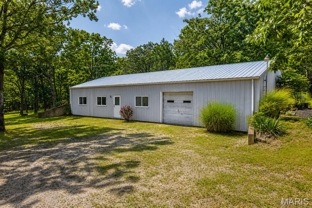 Welcome to your own private retreat! Situated on approximately 19 acres, this well-maintained 2-bedroom, 1-bath home offers the perfect blend of peaceful country living and convenient access to everything the Lake of the Ozarks region has to offer.

Inside, you'll find 1,290 square feet of comfortable living space with a functional layout and plenty of natural light. Outside, the acreage provides endless possibilities for hunting, recreation, hobby farming, or simply enjoying the privacy and wildlife.

Located just minutes from Lake of the Ozarks access, several conservation areas, and with convenient access to I-44, this property makes it easy to enjoy boating, fishing, hiking, and travel while still coming home to the tranquility of the countryside.

Whether you're looking for a full-time residence, weekend getaway, or investment property, opportunities like this don't come along often. Experience the space, privacy, and location this unique property has to offer.