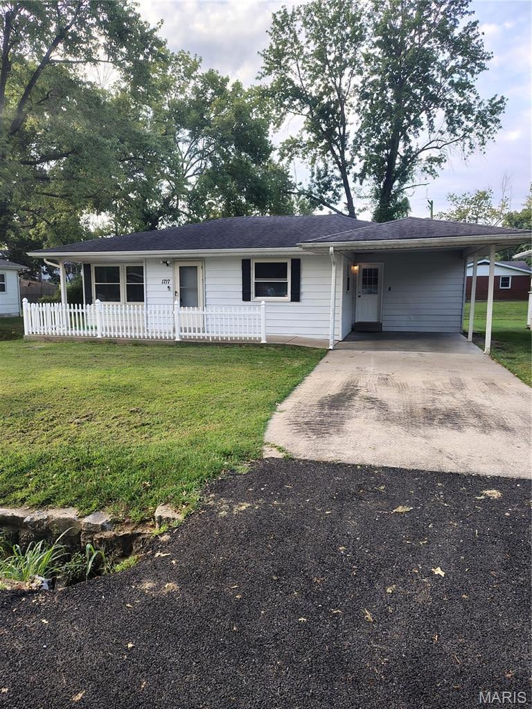 Ready to move into. Laundry on first level. Lite & bright. Recent paint, flooring, furnace/AC, water heater, & more. Fresh re-do of bathroom, vanity, etc. Clean basement large play area. Fresh paint & new sump pump. Grade school up the block has great play area. Level back yard. 12x10 storage building.